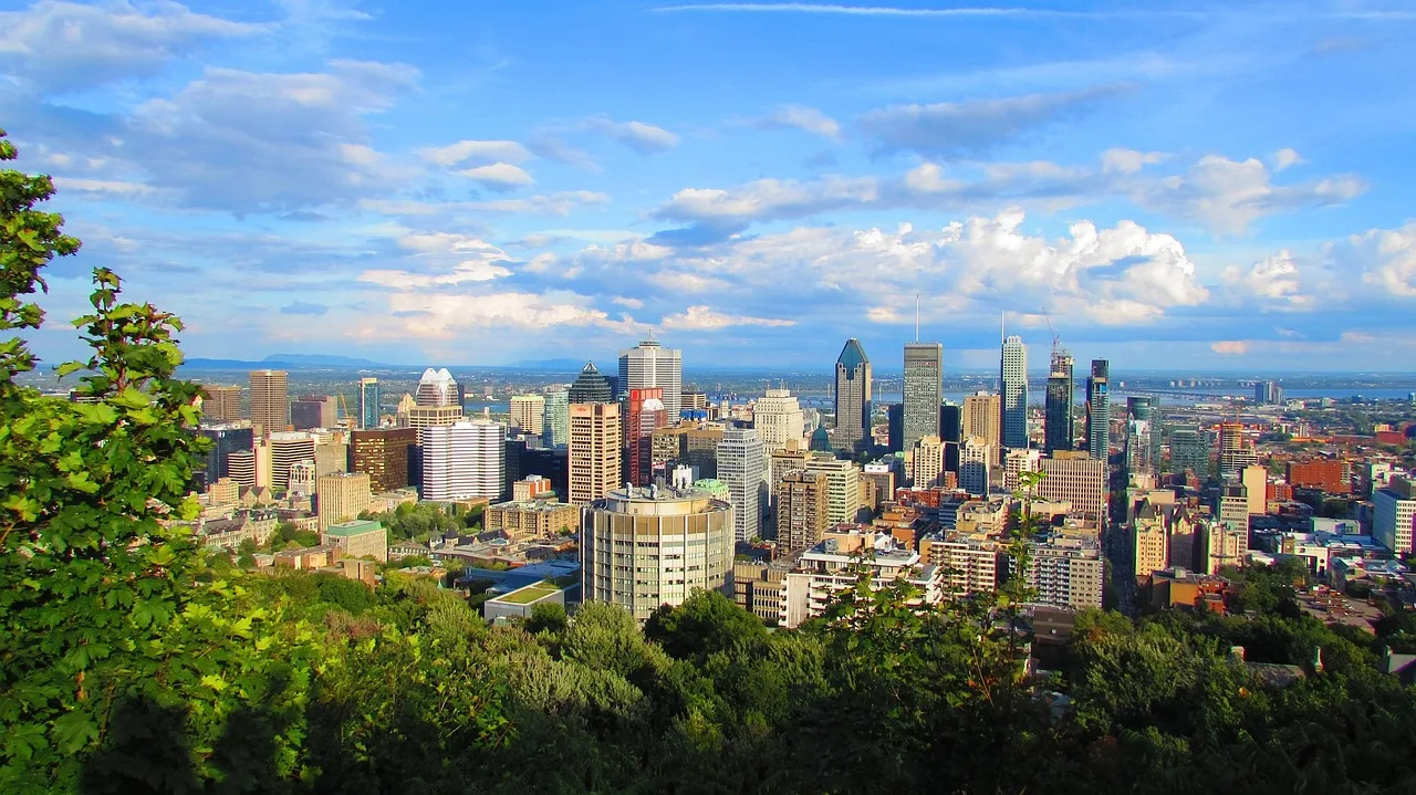 montreal, canada, urban landscape, buildings, apartments, clouds, sunny, office buildings, city, sky view, montreal, montreal, montreal, montreal, montreal. Does Montreal payroll follow Quebec holiday counting under the Civil Code?