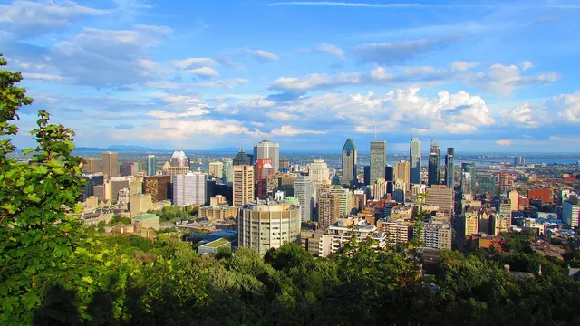 montreal, canada, urban landscape, buildings, apartments, clouds, sunny, office buildings, city, sky view, montreal, montreal, montreal, montreal, montreal. Does Montreal payroll follow Quebec holiday counting under the Civil Code?
